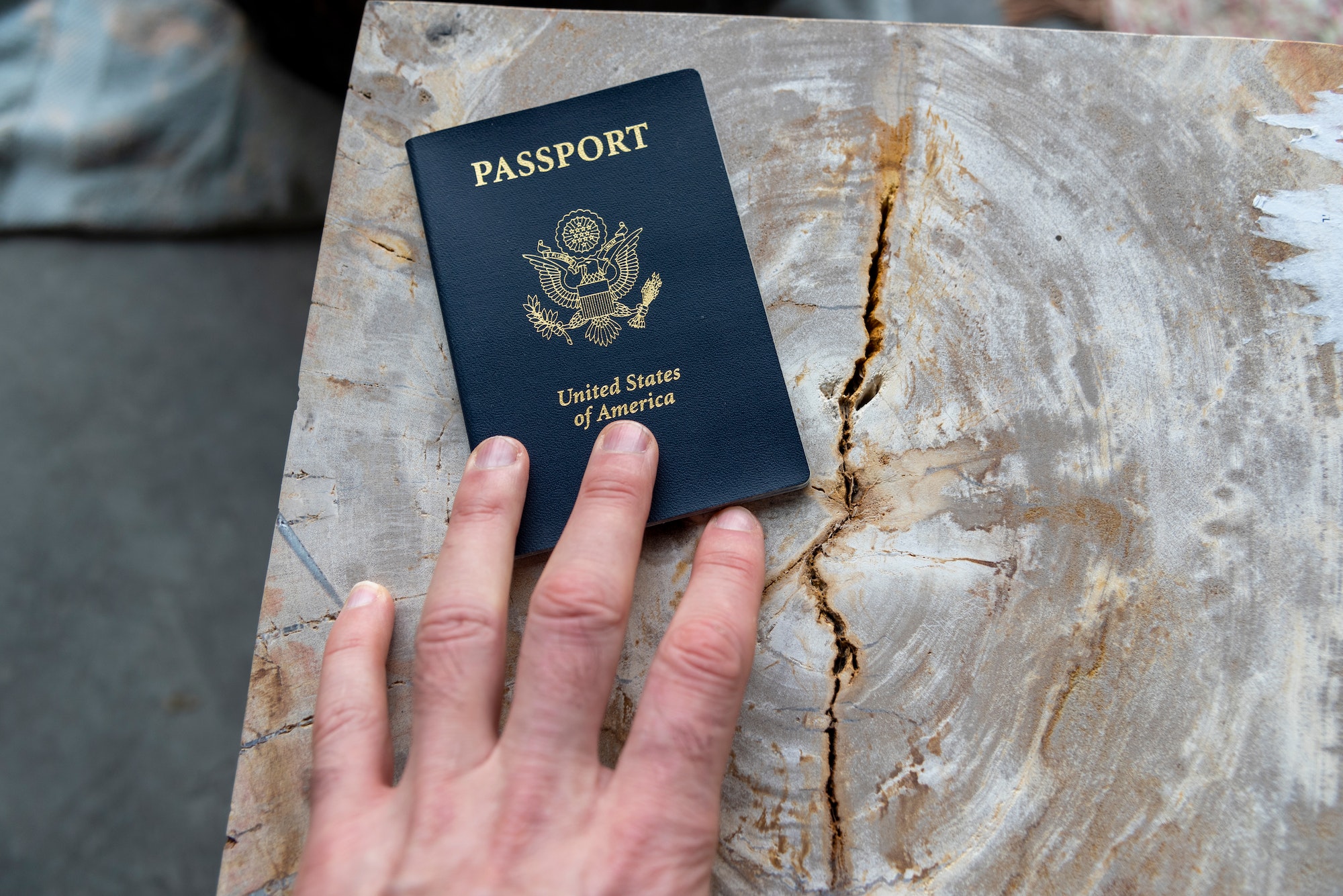 hand-on-passport-personal-perspective.jpg